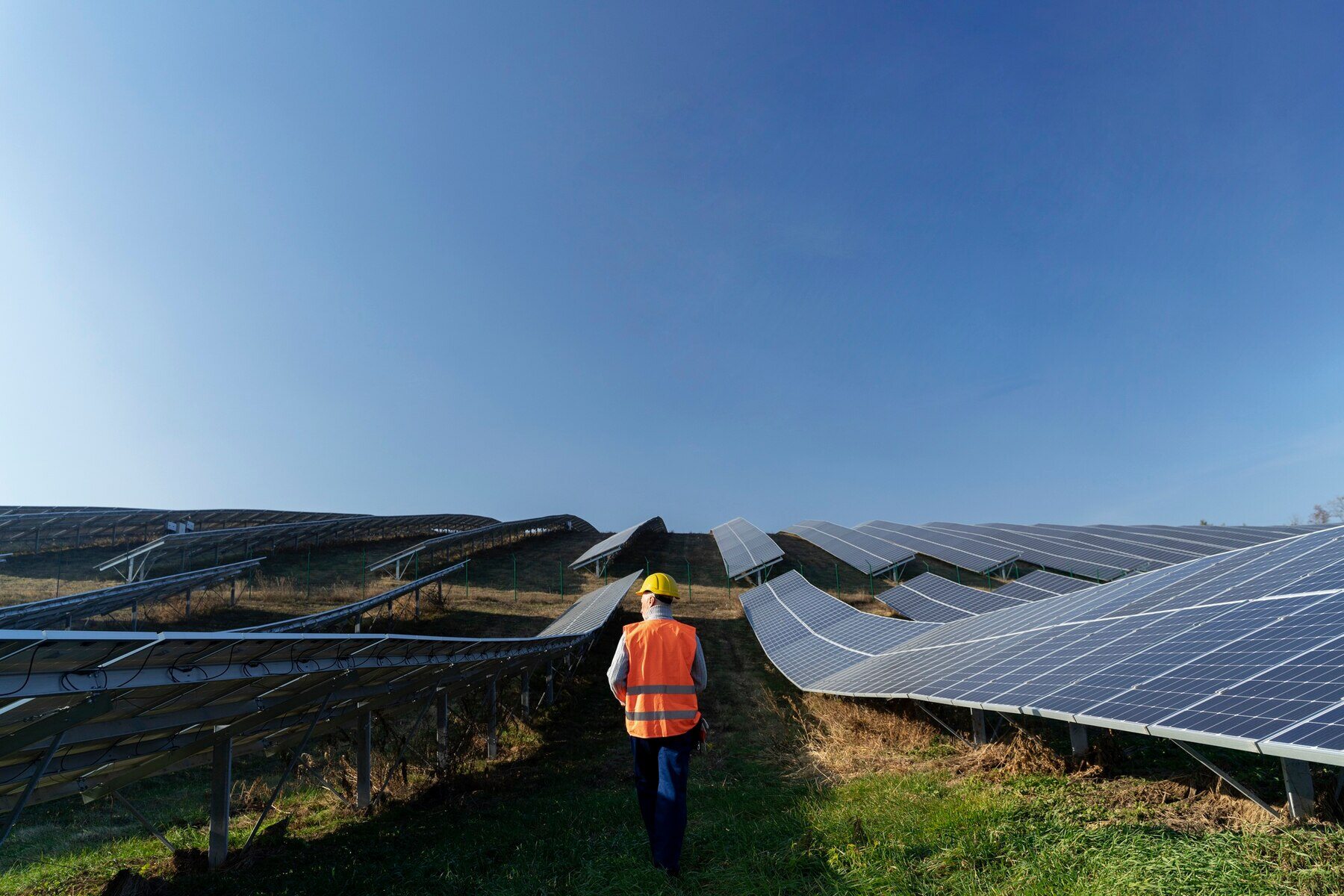 person-near-alternative-energy-plant_23-2149192713
